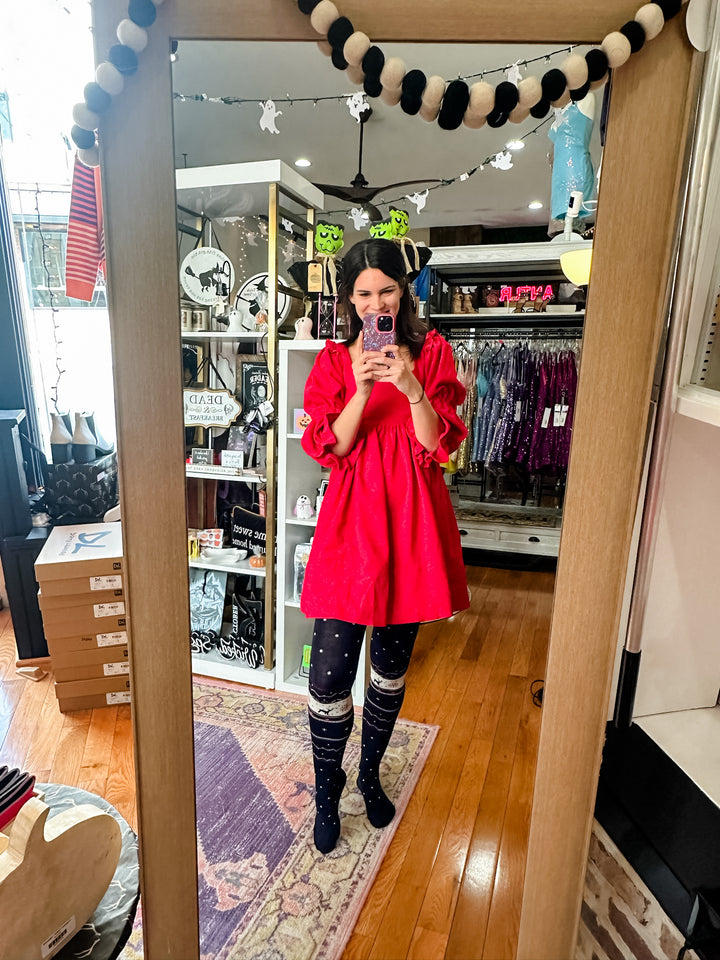 The Red Dress In The Window