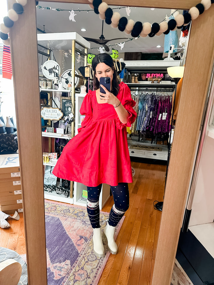 The Red Dress In The Window