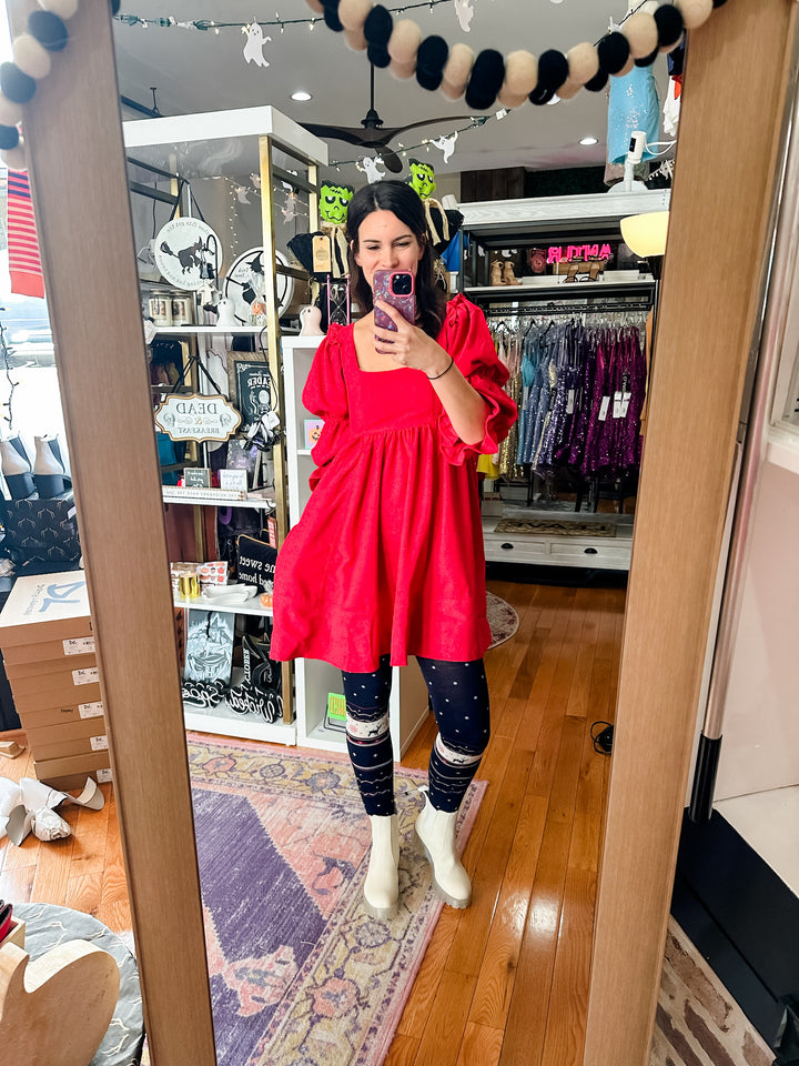 The Red Dress In The Window